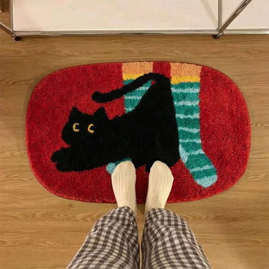 Carpet - kitten scratching its paws